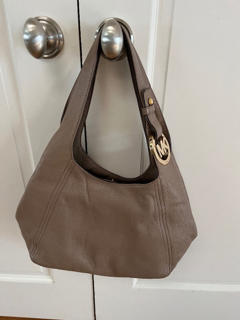 Beautiful, tan leather, Michael Kors bag. Excellent condition